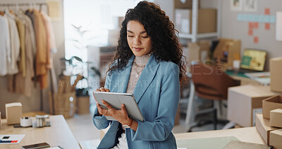 Buy stock photo Woman, fashion designer and tablet for research in logistics or small business management at boutique. Female person or entrepreneur with technology in supply chain, stock or shipping at retail store