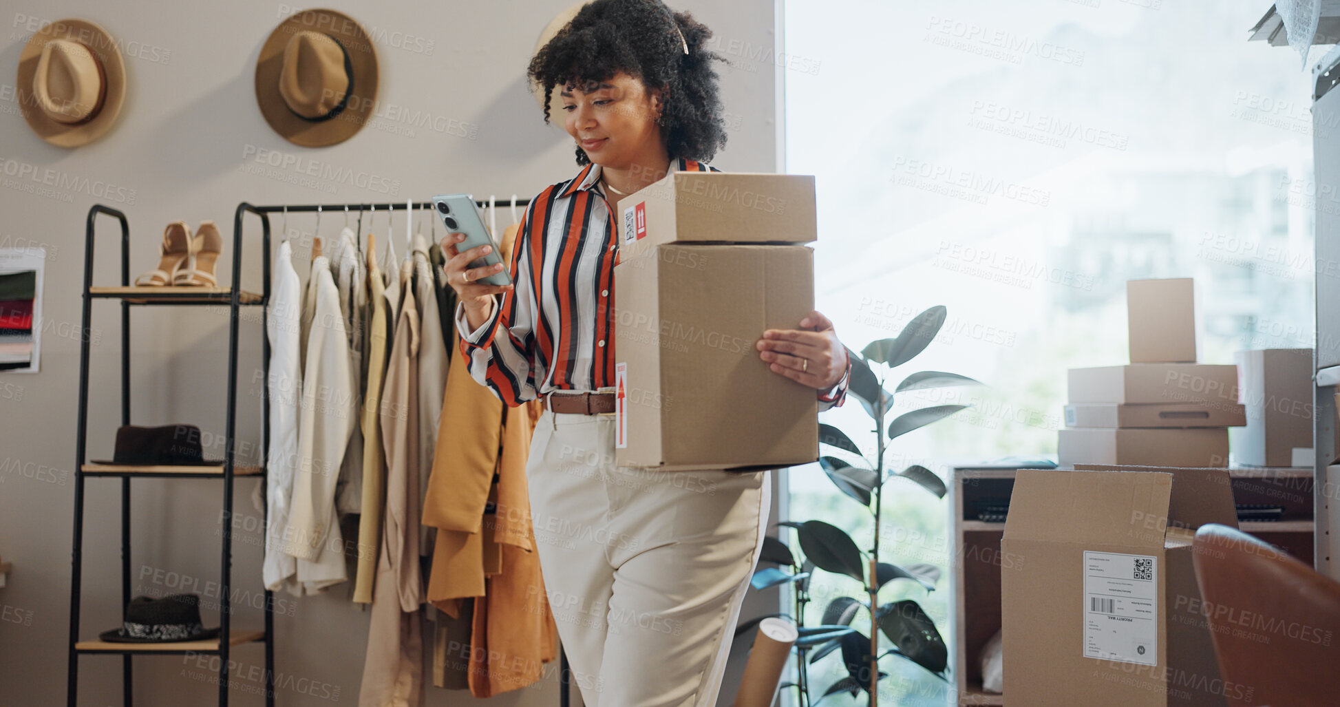 Buy stock photo Happy woman, phone and boxes in logistics for communication, online order or delivery at boutique. Female person or employee on mobile smartphone for shipping, networking or small business at store