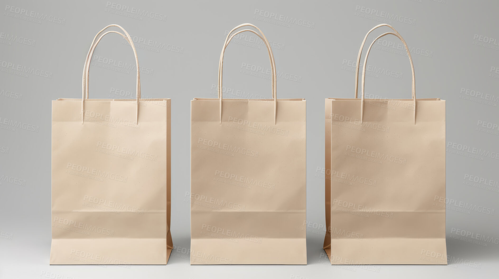 Buy stock photo Mock-up of recycled shopping bag. Blank paper bag template on backdrop. Copy space.