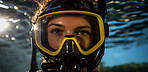 Close-up shot of model wearing goggles underwater. Selfie concept.