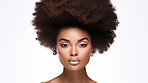 Portrait of young african woman with curly afro hair. Hair care, make-up and hair health