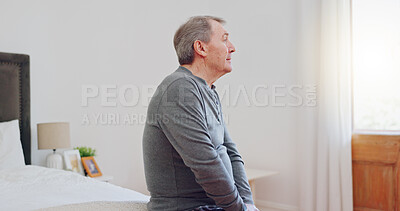 Buy stock photo Lonely, senior man and thinking in bedroom with depression, anxiety or mental health in retirement. Tired, elderly person and remember grief or loss in morning, home or sad in the house with a memory