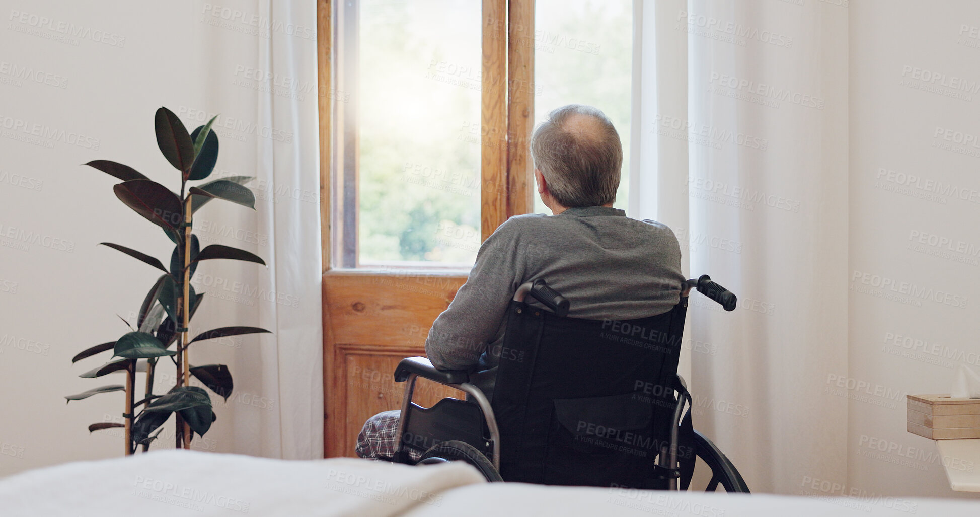 Buy stock photo Wheelchair, thinking and senior man back in retirement home with mental health and grief. Bedroom, sad and elderly male person with disability at window with memory, lonely and dream in a house