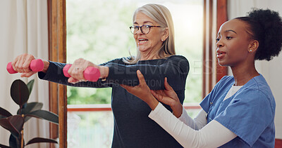 Buy stock photo Physical therapy, exercise and senior woman with dumbbell, weightlifting and training arms and muscle. Strong, fitness and old person with nurse or physiotherapist to help in rehabilitation workout