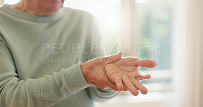 Buy stock photo Senior person, hands and wrist with pain, injury and orthopedic wound at home. Closeup, elderly and ache for arthritis, fibromyalgia and osteoporosis of muscle joint, carpal tunnel and health risk 