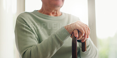 Buy stock photo Hands, senior and walking stick, person with a disability and closeup with wellness. Elderly care, cane to help with balance and support with Parkinson disease or arthritis, sick and health issue