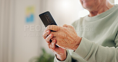 Buy stock photo Home, closeup and senior hands with a smartphone, typing and connection with social media, digital app and contact. Old man, pensioner or mature guy with a cellphone, mobile user and search internet