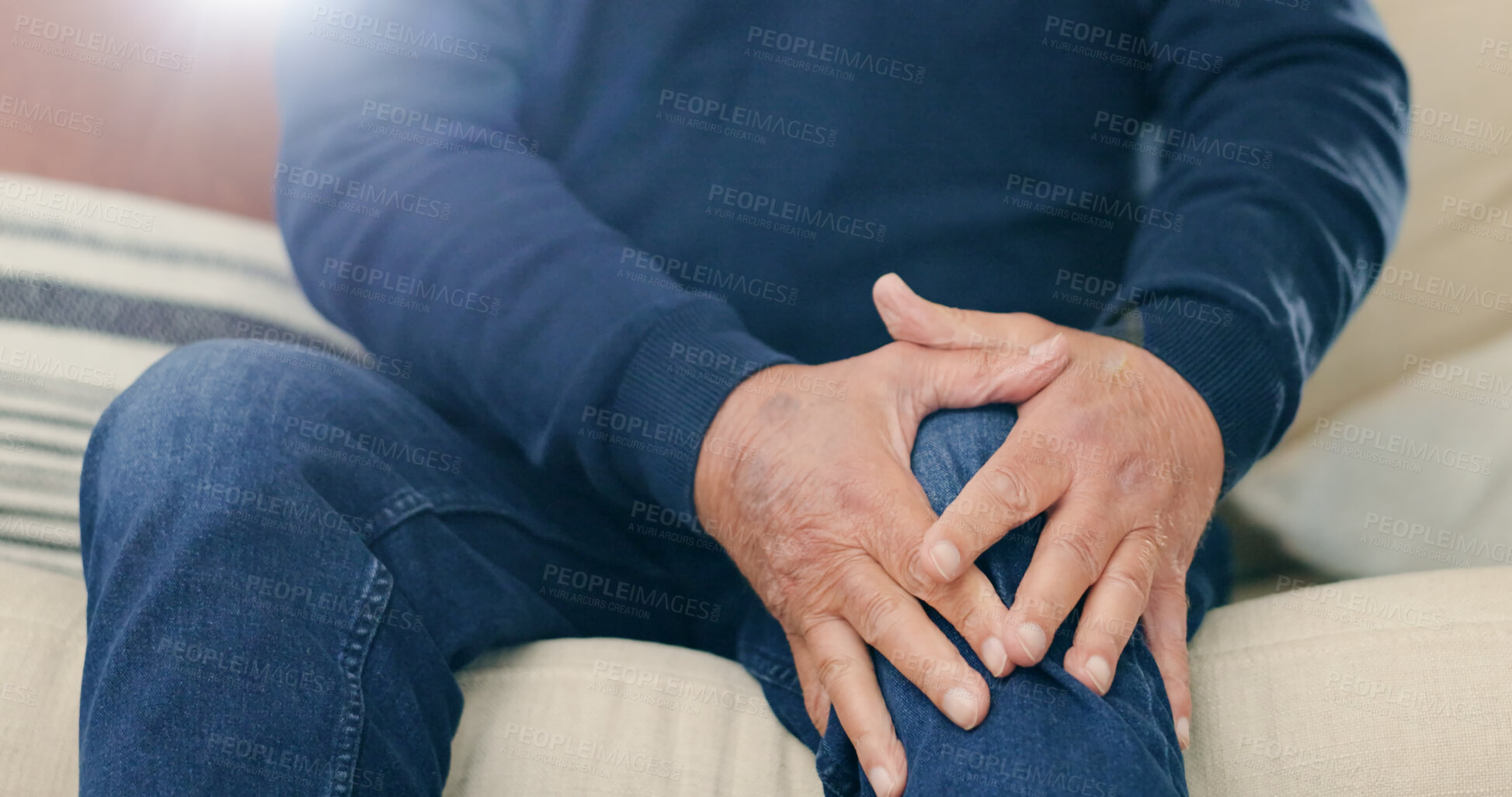 Buy stock photo Home, injury and senior man with knee pain, closeup and inflammation with bruise in a living room. Pensioner, old person and elderly guy on a sofa, accident or emergency with muscle tension or broken