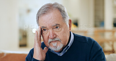 Buy stock photo Stress, headache or old man in house thinking of burnout or worry in retirement frustrated by debt. Sad, anxiety or tired male senior person with problem, crisis or exhausted on couch with migraine