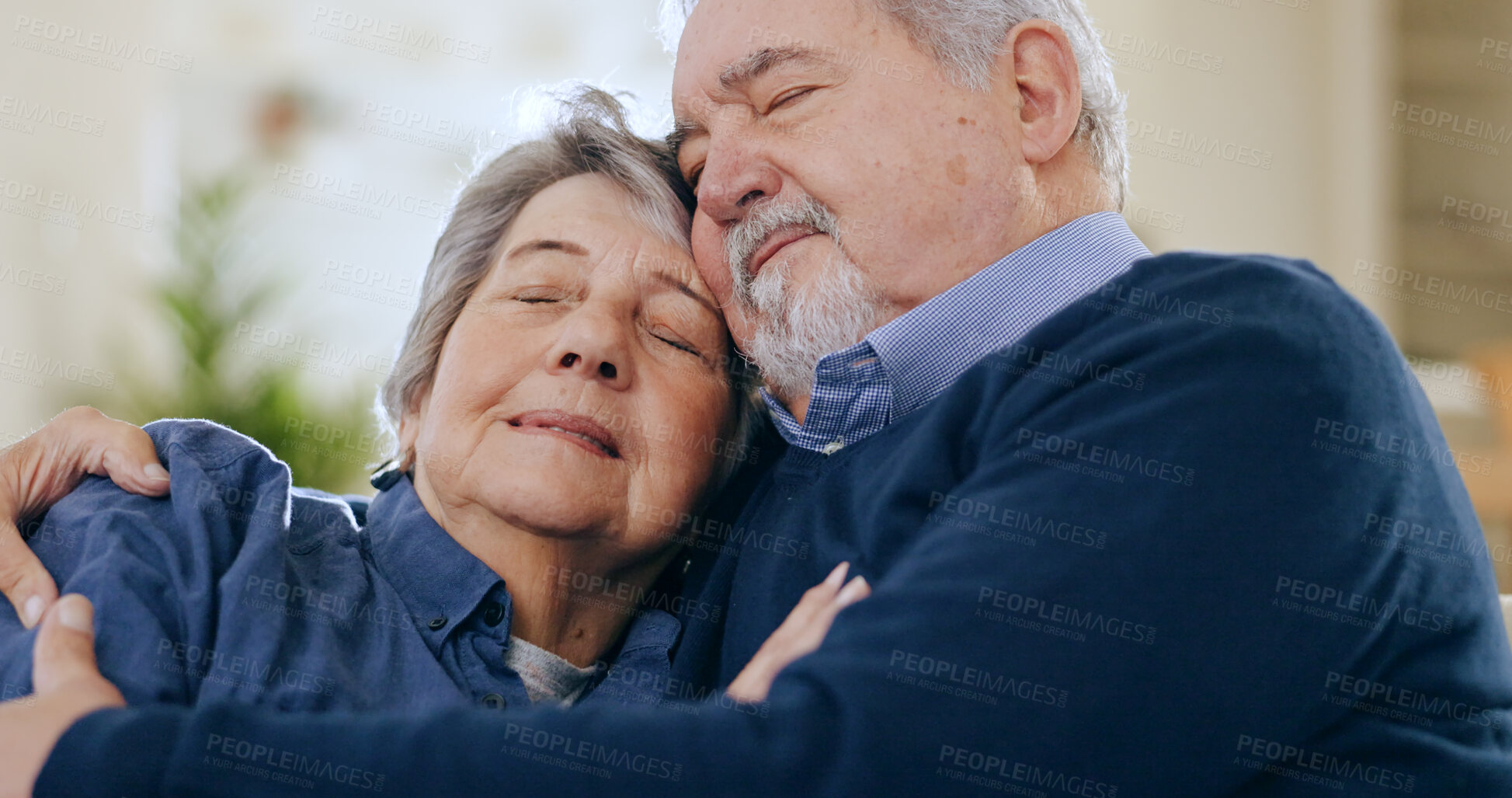 Buy stock photo Relax, peace or senior couple hug in home on a couch, love and happiness with relationship in living room. Resting, old man or elderly woman on sofa for support or embrace in retirement or marriage