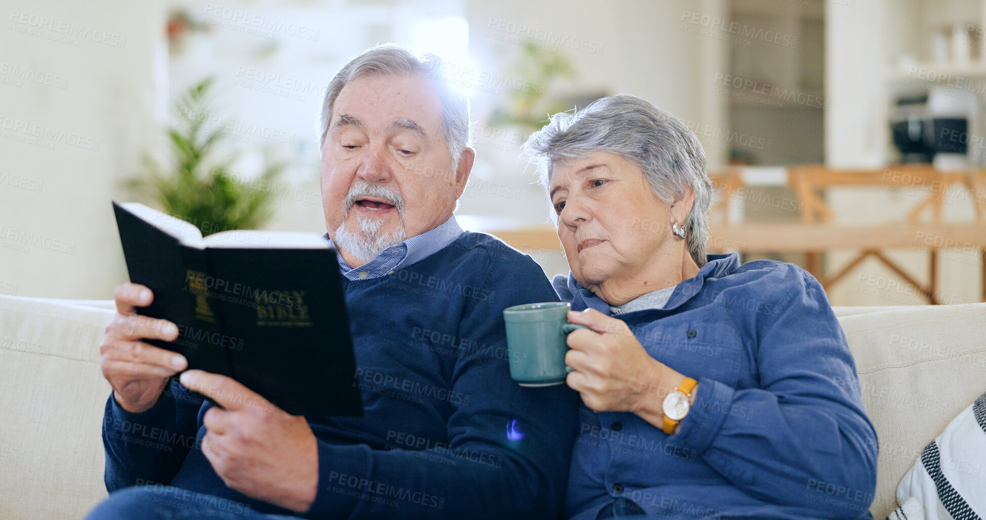 Buy stock photo Coffee, bible and a senior couple in their home to read a book together during retirement for religion. Faith, belief or spiritual with an elderly man and woman learning about god in the living room