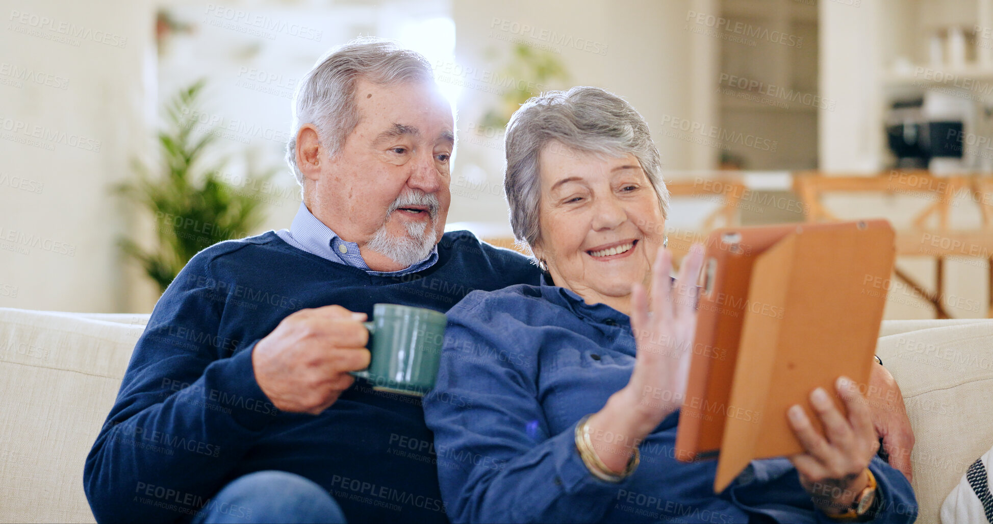 Buy stock photo Tablet, coffee and a senior couple in their home to relax together during retirement for happy bonding. Technology, smile or love with an elderly man and woman drinking tea in their living room