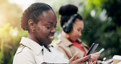 Phone, business or happy black women at park, reading email or notification. Smartphone, scroll or professional consultant outdoor on mobile app, typing on social media or communication on technology