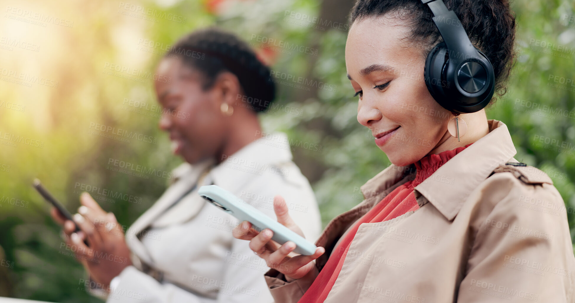 Buy stock photo Happy, phone and woman with headphones for fun, funny and podcast or song, energy and relax in outdoors. People, streaming radio and music or audio, nature and internet on smartphone for playlist