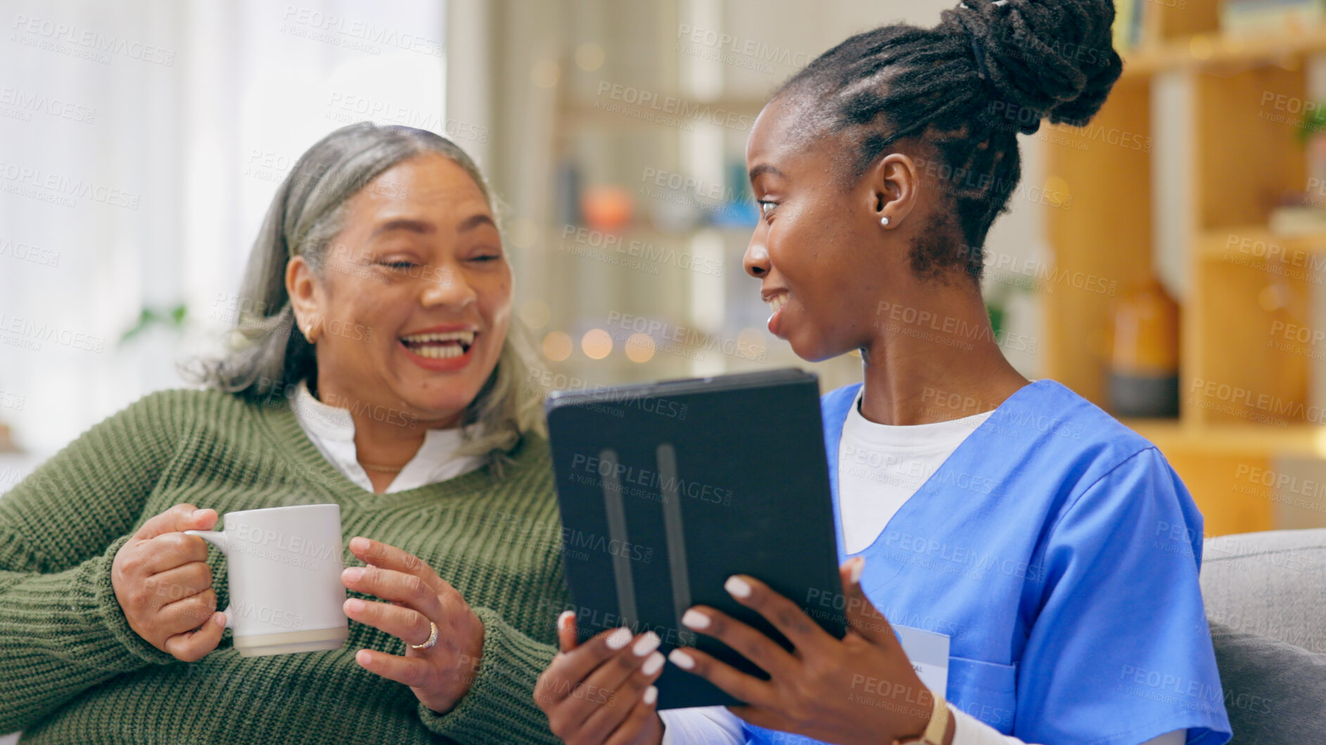 Buy stock photo Home, old woman and nurse with a tablet, connection and email notification with internet, love or social media. Black woman, caregiver or elderly person on a sofa, technology or conversation with app