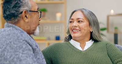 Buy stock photo Senior couple, smile and conversation in home living room, love and bonding together to relax. Happy elderly man, woman in lounge and connection, healthy relationship and care in retirement in house