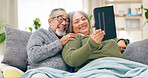 Tablet, relax and senior couple with retirement, home and marriage with humor, happiness and cheerful. Apartment, elderly woman and old man with tech, calm and relationship with social media and app