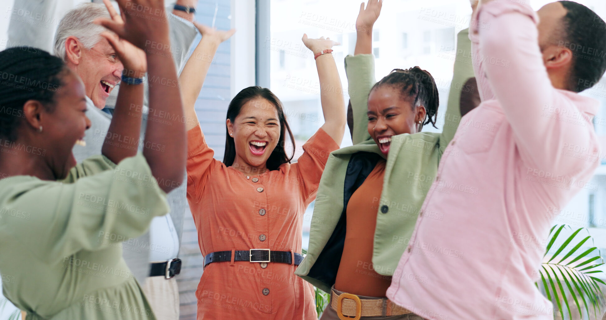 Buy stock photo Happy creative people, meeting and celebration for teamwork, business or success together at office. Group of employees smile with hands in air for team achievement, promotion or startup at workplace