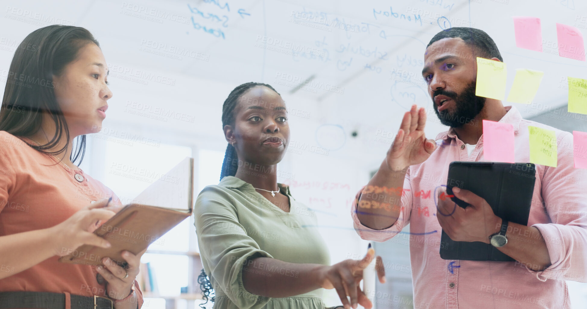 Buy stock photo Business people, teamwork and meeting for schedule planning, sticky notes or strategy on glass board at office. Group of employees in team brainstorming, ideas or reminder for agenda together