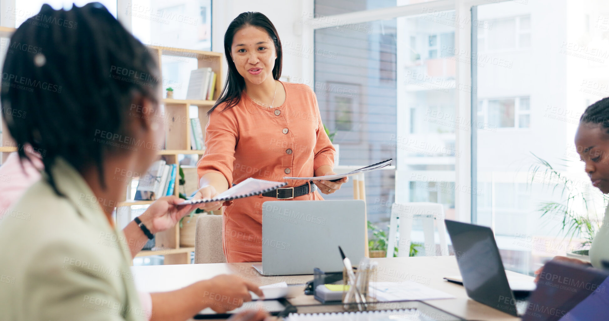 Buy stock photo Business people in meeting with documents, proposal and boss at laptop in workshop together. Planning, strategy and management with women at table with team, paperwork and project development report.