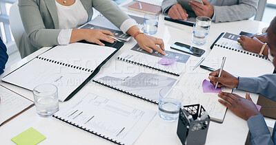 Business people, hands and writing with documents in planning, schedule or meeting on office table. Closeup of employee group with paperwork for tasks, strategy or brainstorming ideas at workplace