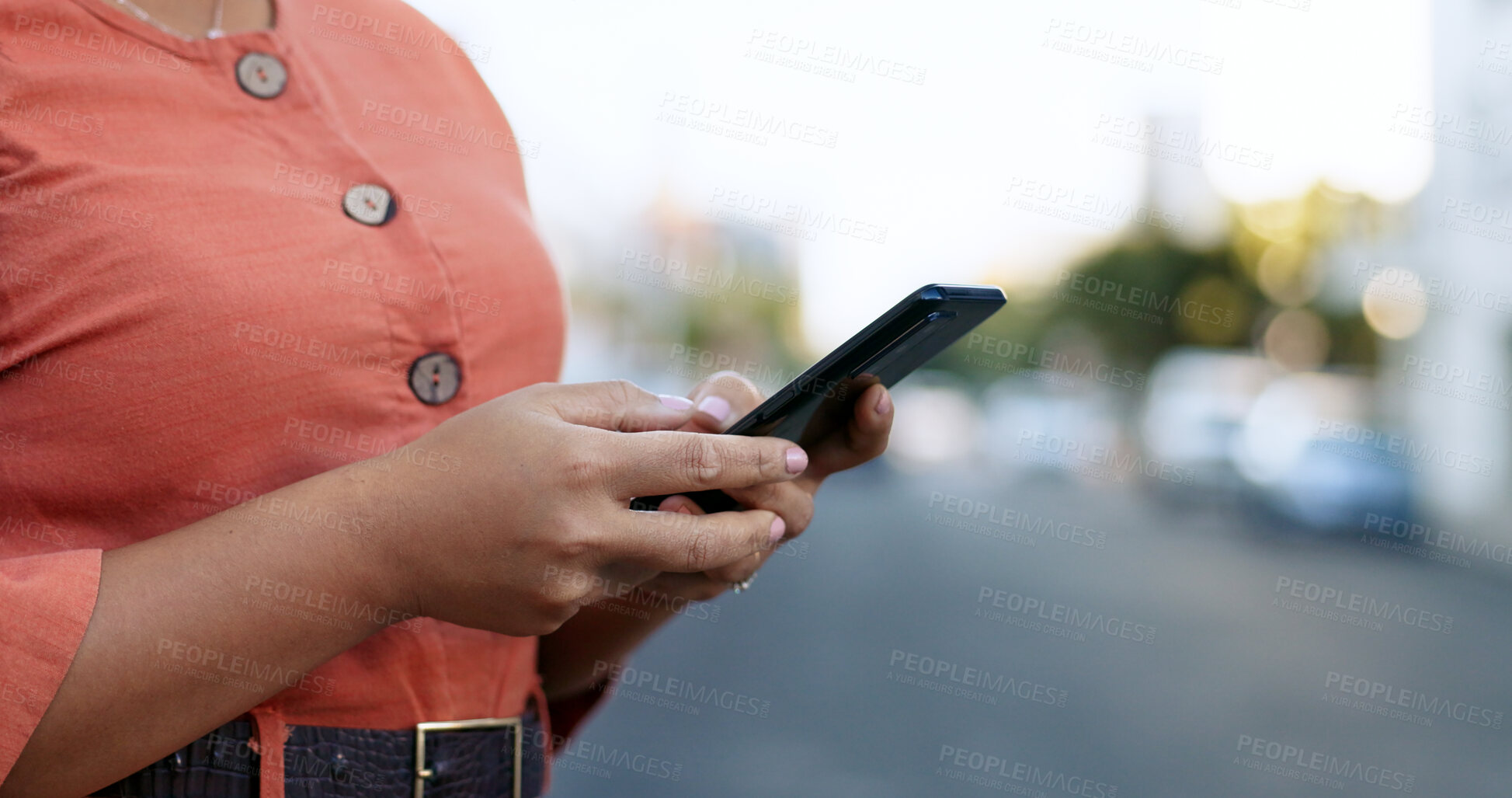 Buy stock photo Hands typing, smartphone and woman in city on social media, internet search or communication. Closeup, phone or person scroll on digital technology, notification or writing email on mobile app online