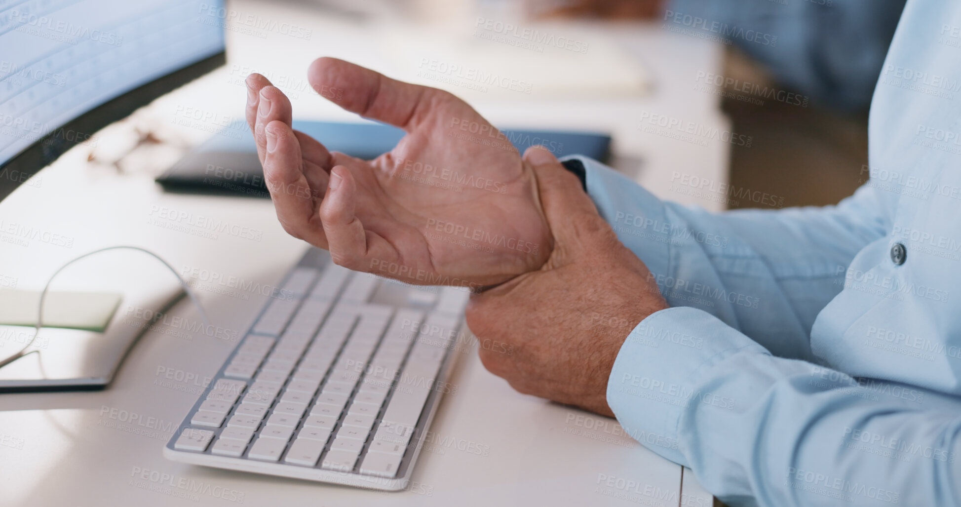 Buy stock photo Businessman, hands and wrist in joint pain from injury, overworked or carpal tunnel syndrome at office. Closeup of man or employee with arthritis, ache or inflammation of palm on desk at workplace