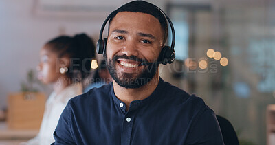 Night, call center and portrait of happy man in office consulting for contact us, faq or crm. Working late, smile and face of male consultant with friendly smile for telemarketing or customer support