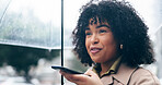 Umbrella, phone call and woman with conversation, speaker and communication with weather. Network, girl and lady with a smartphone, rain and winter with mobile user, talking and discussion in a city