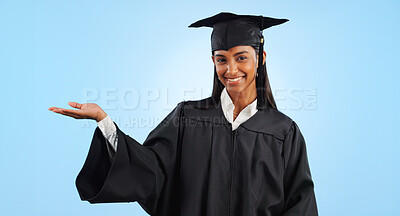 Graduation student, portrait and happy woman palm gesture for learning news, university info or college study. Studio mockup space, presentation or graduate scholarship opportunity on blue background