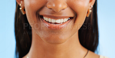 Buy stock photo Teeth whitening, closeup of dental and woman with smile for oral care, wellness and mouth on blue background. Beauty, hygiene and orthodontics with skin, cosmetics and healthy in studio with veneers