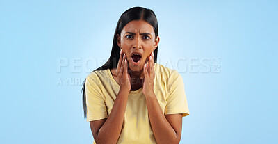 Buy stock photo Shock, surprise and woman in portrait in studio with reaction, facial expression and horror on blue background. Open mouth, wow for news or announcement, mockup space and gossip drama with mind blown