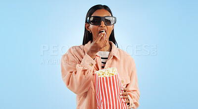 Buy stock photo Woman, cinema and 3D glasses with popcorn, streaming and entertainment with vision on blue background. Theater corn snack, film or movie with user experience, television and holographic in studio
