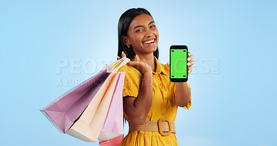Buy stock photo Smartphone green screen, shopping bag and portrait of happy woman show online shop, retail market or studio omnichannel. Tracking markers, phone chroma key or mockup space customer on blue background
