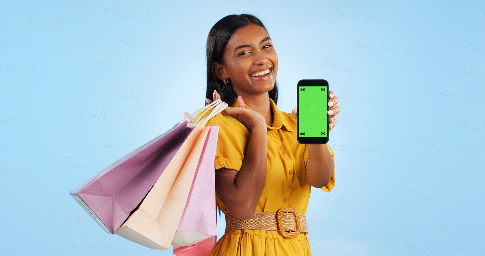 Buy stock photo Smartphone green screen, shopping bag and portrait of happy woman show online shop, retail market or studio omnichannel. Tracking markers, phone chroma key or mockup space customer on blue background