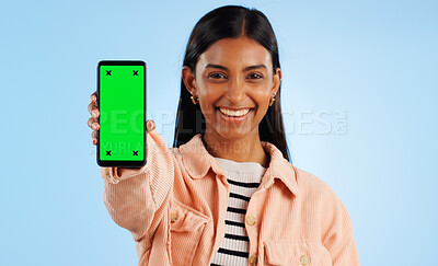 Buy stock photo Smartphone green screen, happy portrait and woman show web communication, mobile search engine or app chroma key. Tracking markers, cellphone mockup space and studio tech person on blue background