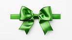 Green bow on white background. Gift, present, decor for birthday, Valentine or christmas