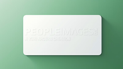 Blank white business card or gift voucher card on a green background. Birthday gift
