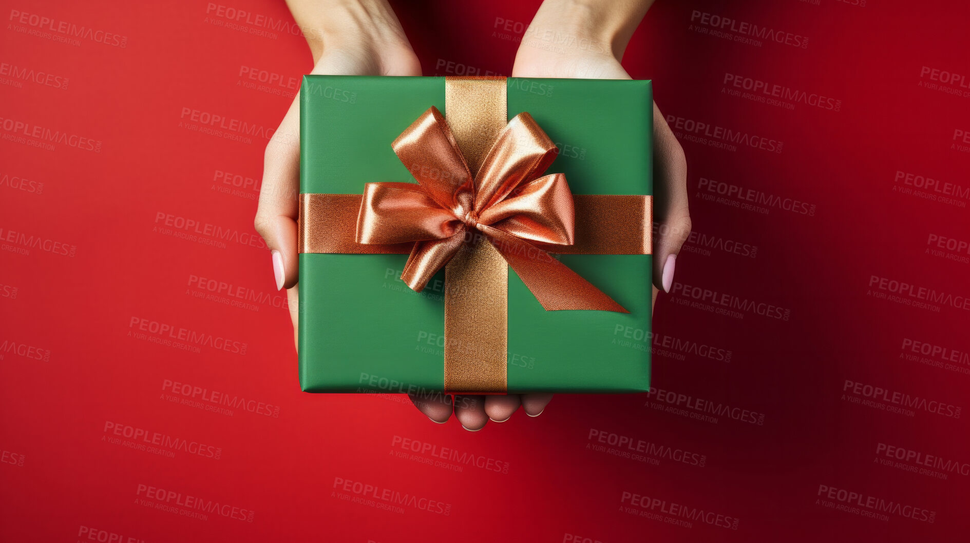 Buy stock photo Hand holding a green gift box with gold bow, on a red table. Valentine, Christmas or birthday