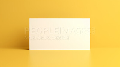 Blank white business card or gift voucher card on a yellow background. Birthday gift