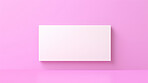 Blank white business card or gift voucher card on a pink background. Birthday gift