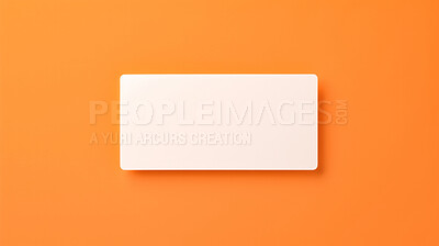 Blank white business card or gift voucher card on a orange background. Birthday gift