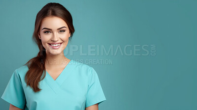 Friendly medical doctor or nurse in teal uniform scrubs on copyspace background.