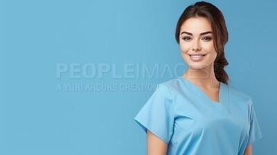 Friendly medical doctor or nurse in blue uniform scrubs on copyspace background.