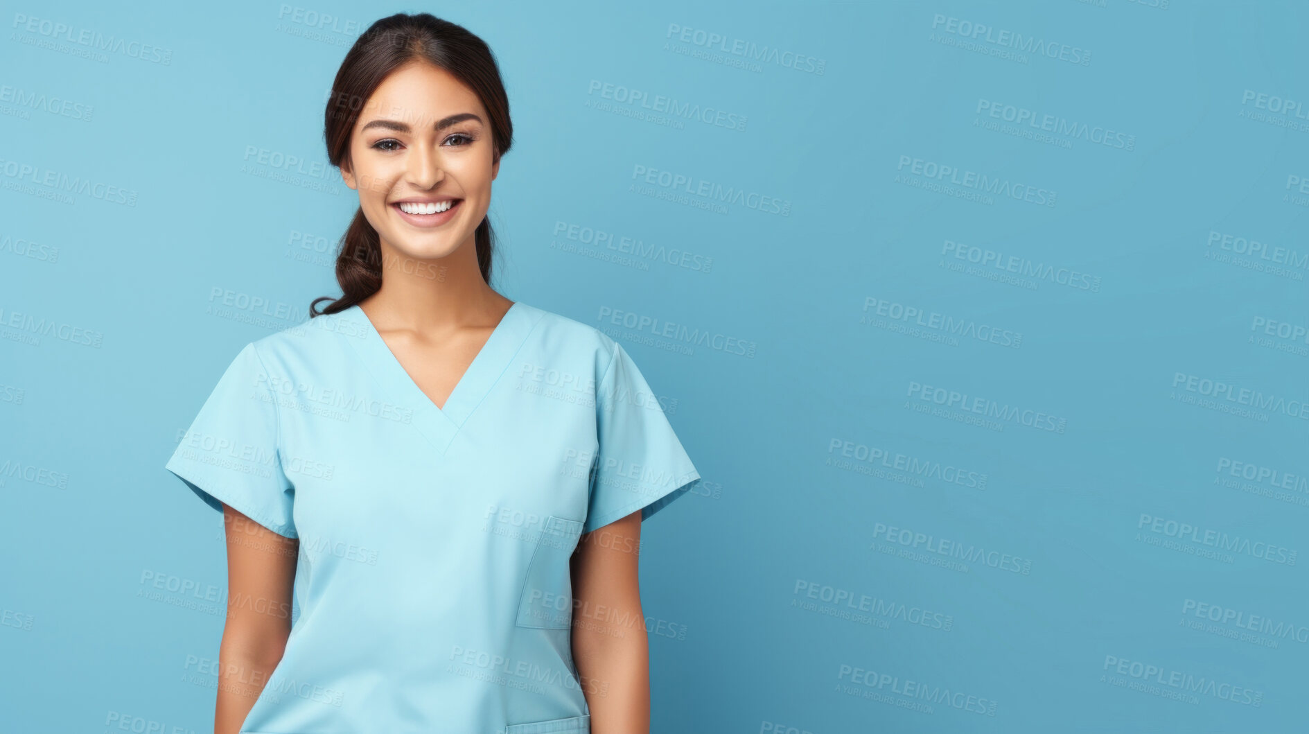 Buy stock photo Friendly medical doctor or nurse in blue uniform scrubs on copyspace background.