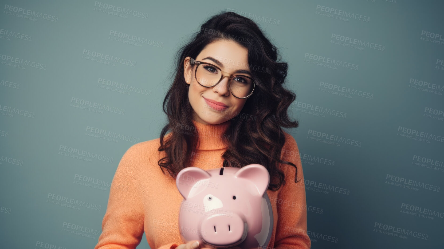 Buy stock photo Young woman holding a piggy bank. Savings, budget and money management concept