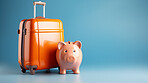 Piggy bank with luggage, for travel, holiday or vacation. Money saving budget concept