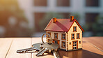 Key with a house shape keychain. Real estate, home owner or home loan concept