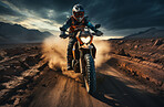 Action shot of motor cross motorcyclist speeding on dirt road. Extreme sport concept.