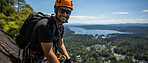 Candid shot of rock climber couple on mountain top. Extreme sport concept.